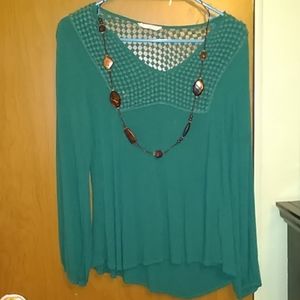 Green long sleeve shirt with necklace
